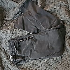 Grey moto skinny jeans with zipper pockets